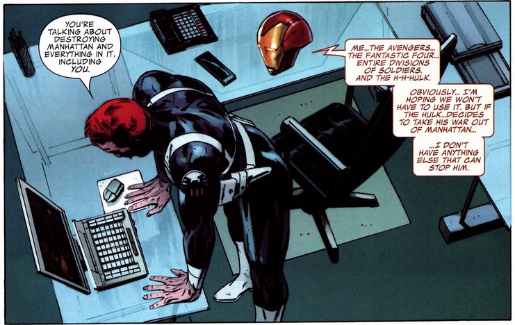 Dum Dum Dugan leaning over Tony Stark's desk